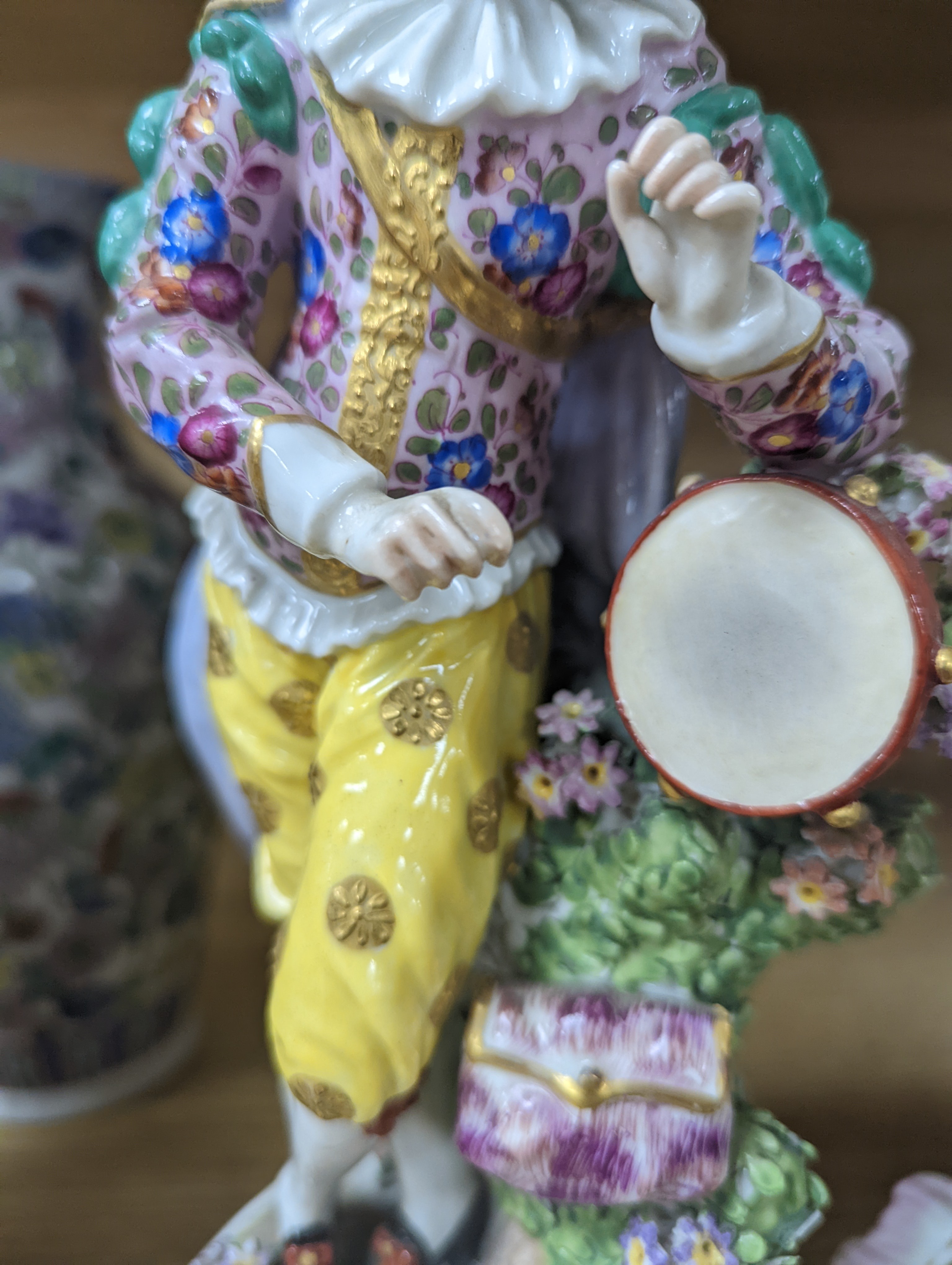 Two Continental porcelain figures, a lady and a gent 27cm